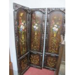 A Thee Panelled Folding Screen, studded and leatherette, painted with foliage, 180cm high.