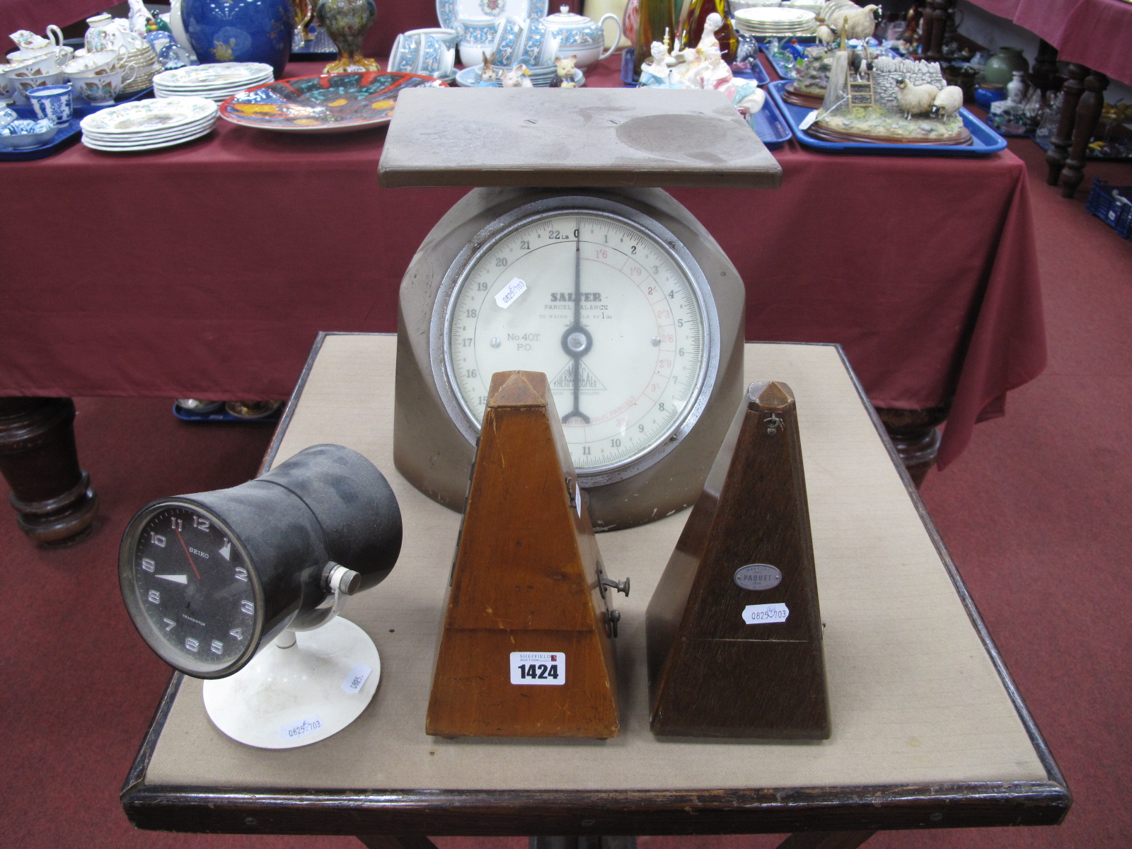 Paquet and One Other Metronome, Seiko transistor clock, on cream circular base, Salter parcel