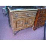 Light Oak Cabinet, with carving to drawer, over cupboard doors, 74.5cm wide.