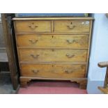 A XIX Century Mahogany Straight Fronted Chest, of two small over three long graduated drawers,