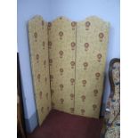 A Three Panelled Folding Screen, with ballooning scenes, to yellow fabric, 153cm high.