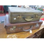 An Early XX Century Heavy Gauge Leather Suitcase, approx 61cm wide; together with a faux snakeskin