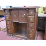 A Victorian Floorstanding Sewing Machine Cabinet, with two banks of five drawers to each side;