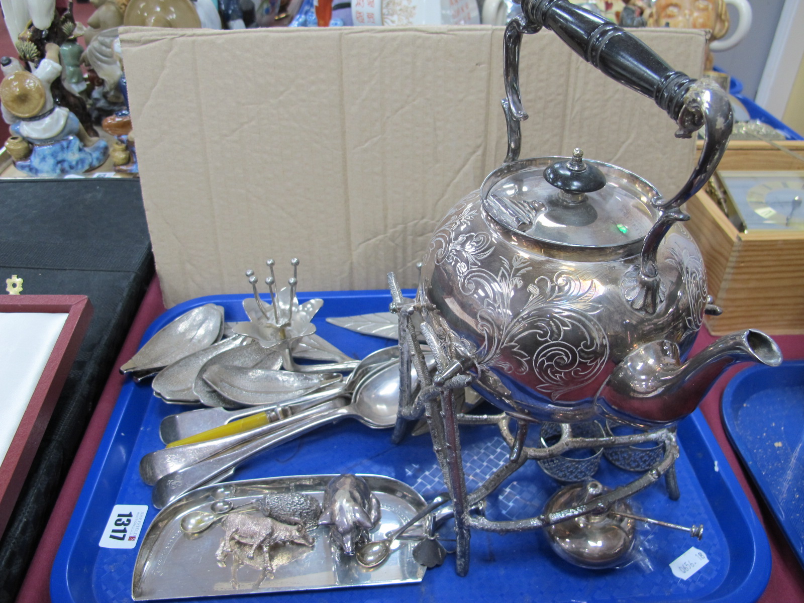 Plated Spirit Kettle, on naturalistic stand, cutlery, napkin rings, model animals:- One Tray