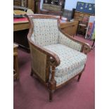 A Scumbled Regency Style Easy Chair, with bergeres sides and scroll arms.