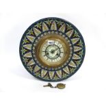 A Late XIX Century Mantle Clock, the pottery surround painted in enamels with flowers, the white