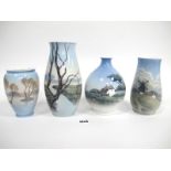 Four Royal Copenhagen Porcelain Vases, of various shapes, all painted with landscape scenes,
