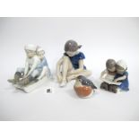 A Royal Copenhagen Porcelain Model of a Young Ballerina, seated putting on her shoe, printed and