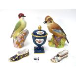 Two Royal Worcester Porcelain Models of Birds, 'Jay' and 'Woodpecker', black marks, 16-18cm high;