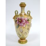 A Royal Worcester Porcelain Vase, of two handled footed ovoid form, the blue ivory ground printed