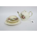 An XVIII Century Creamware Pottery Teapot and Cover, with flower knob, possibly Leeds, the