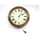 A Late XIX Century Circular Mahogany Cased Wall Clock, the white enamel dial with black Roman