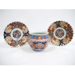 A Pair of Late XIX Century Japanese Imari Pottery Chargers, of shaped circular form, painted in