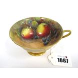 A Royal Worcester Porcelain Tea Cup, painted by W.H. Austin, signed, with ripening fruit on a