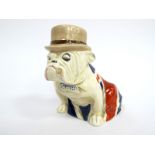 A Royal Doulton Pottery Model of a Bull Dog, draped with a union jack and wearing a bowler hat,