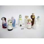 Nine Royal Worcester Porcelain Candle Snuffers, to include; Monk, Howard, Nun, Feathered Hat, Boy