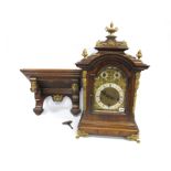 A Late XIX/Early XX Century German Large Walnut Cased Bracket Clock, with painted gilt metal mounts,