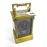 A Late XIX Century Brass Carriage Clock, with Corinthian column supports, the sides enamelled with