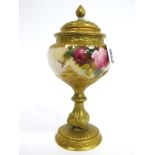 A Royal Worcester Porcelain Pedestal Vase and Pierced Cover, painted by E. Spilsbury, signed, with