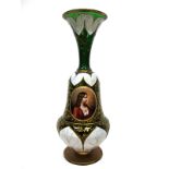 A Late XIX Century Bohemian Glass Vase, the green ground overlaid in white with stylised leaves