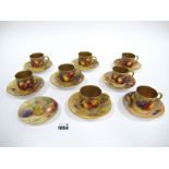 Eight Royal Worcester Porcelain Coffee Cans and Saucers and an Odd Saucer, all painted with ripening