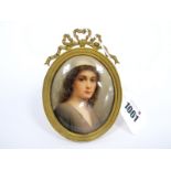 A Late XIX Century Berlin Porcelain Oval Plaque, painted with a portrait of Ruth, signed Wagner,