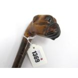 A Late XIX Century Wooden Walking Stick, the pommel carved as a pug's head with glass eyes, 88cm