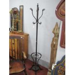Cast Metal Coat Stick Stand, with a drip tray, scroll feet.