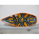 Poole Pottery 'Delphis' Spear Shaped Dish, with abstract design on fiery orange ground, shape No 82,