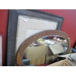 An Oak Oval Shaped Wall Mirror, together with an early XX Century framed photograph of a lady. (2).