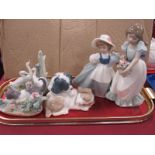 Lladro Figure of Cat with Frog, Nao puppies, girl with flowers, girl with ewer and geese (5).