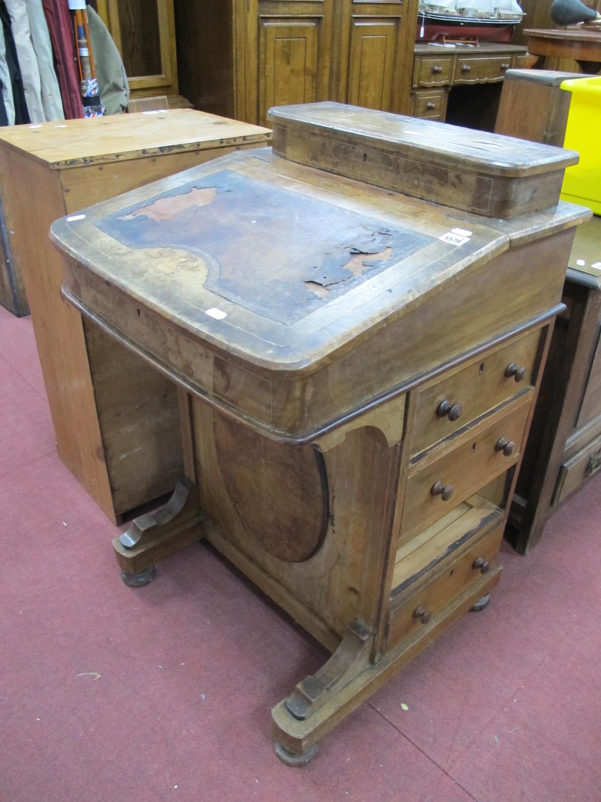 A XIX Century Davenport, upper section with a hinged lid, fitted interior, fall front, four drawers,