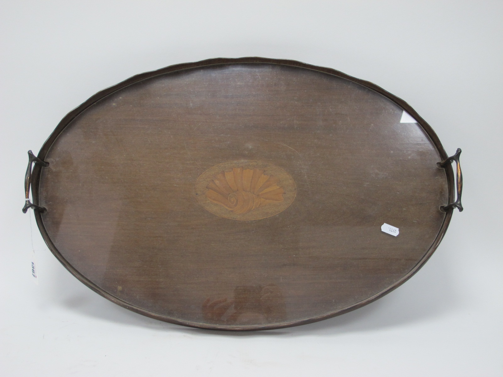 Early XX Century Mahogany Oval Shaped Tray, with a scalloped edge, marquetry shell inlay.