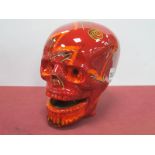 Anita Harris Pottery Model of a Large Skull, gold signed, 19cm high, 18cm wide.