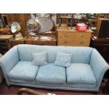 A XX Century Three Seater Settee, in pale blue floral damask, on small cabriole legs.