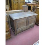 A XIX Century Joined Oak Blanket Box, with a hinged lid, two panelled front over a single drawer, on