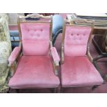 An Early XX Century Walnut His Hers Chairs, with a shaped top rail,upholstered back, seats, on