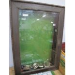 A Table Top Display Cabinet, 86cm wide containing pastry cutter, coasters, protractor, feeding