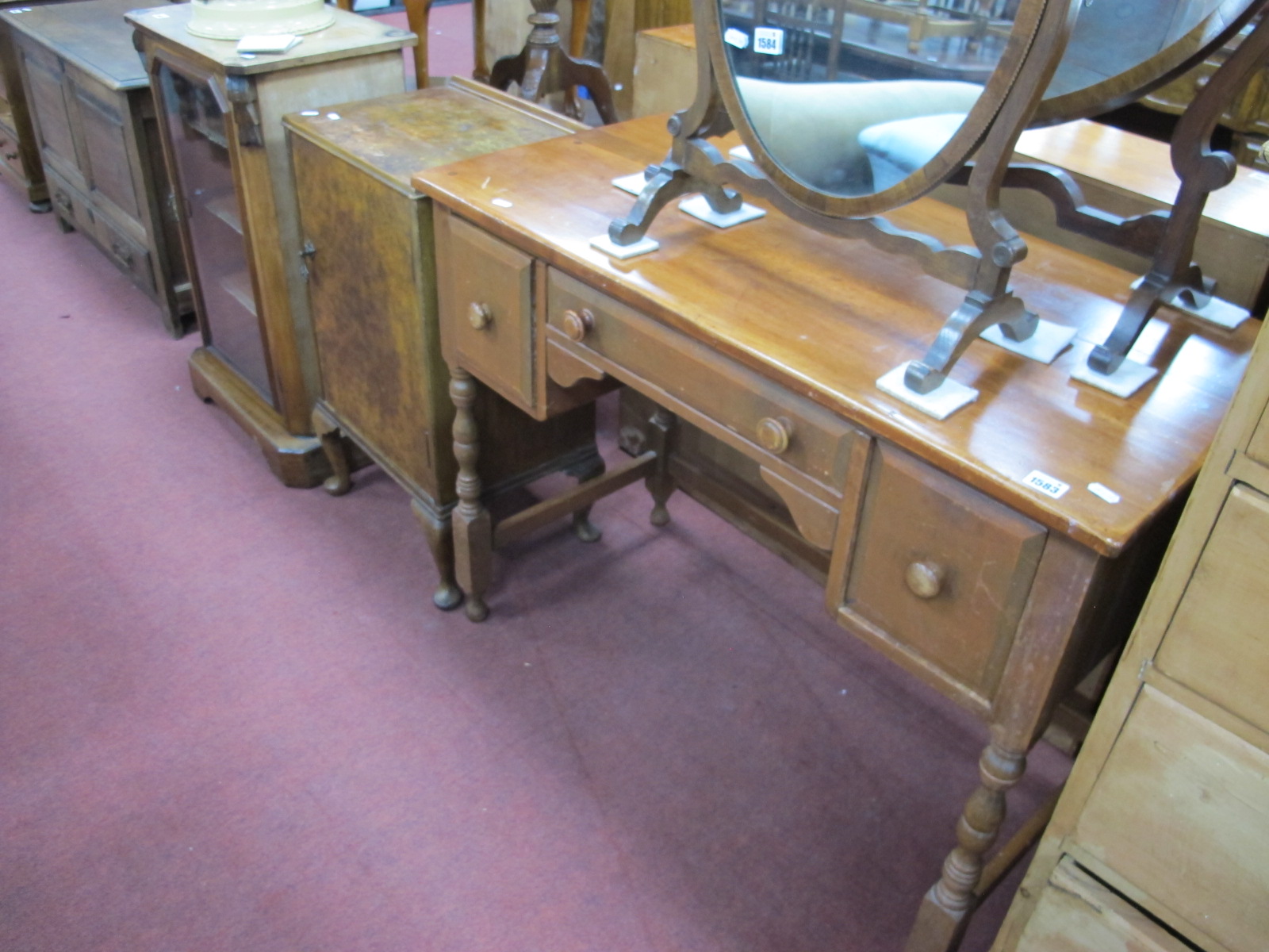 A XX Century Dressing Table, with one long drawer, two short drawers, on turned and block