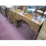 A XX Century Dressing Table, with one long drawer, two short drawers, on turned and block
