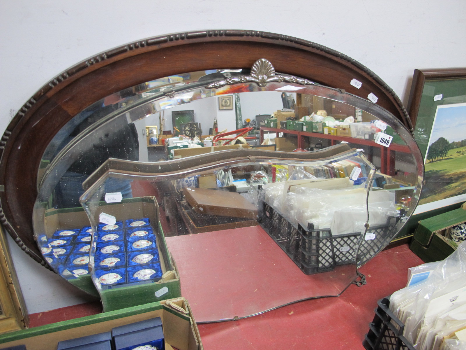 An Early Xx Century Mahogany Oval Shaped Wall Mirror, together with two other vintage mirrors. (3).