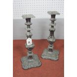 A Pair of Antique Style Plated on Copper Candlesticks, each with acanthus leaf decoration and