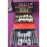 A Modernist Style Stainless Steel Cutlery Set, six setting, in original box; Together with An