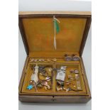Assorted Cufflinks, pin badges, souvenir page marker, bangle, chain, etc, contained in a leather