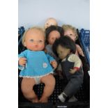 A Collection of Five Modern Dolls,to include a Sasha Baby Doll approximately 29cm high.