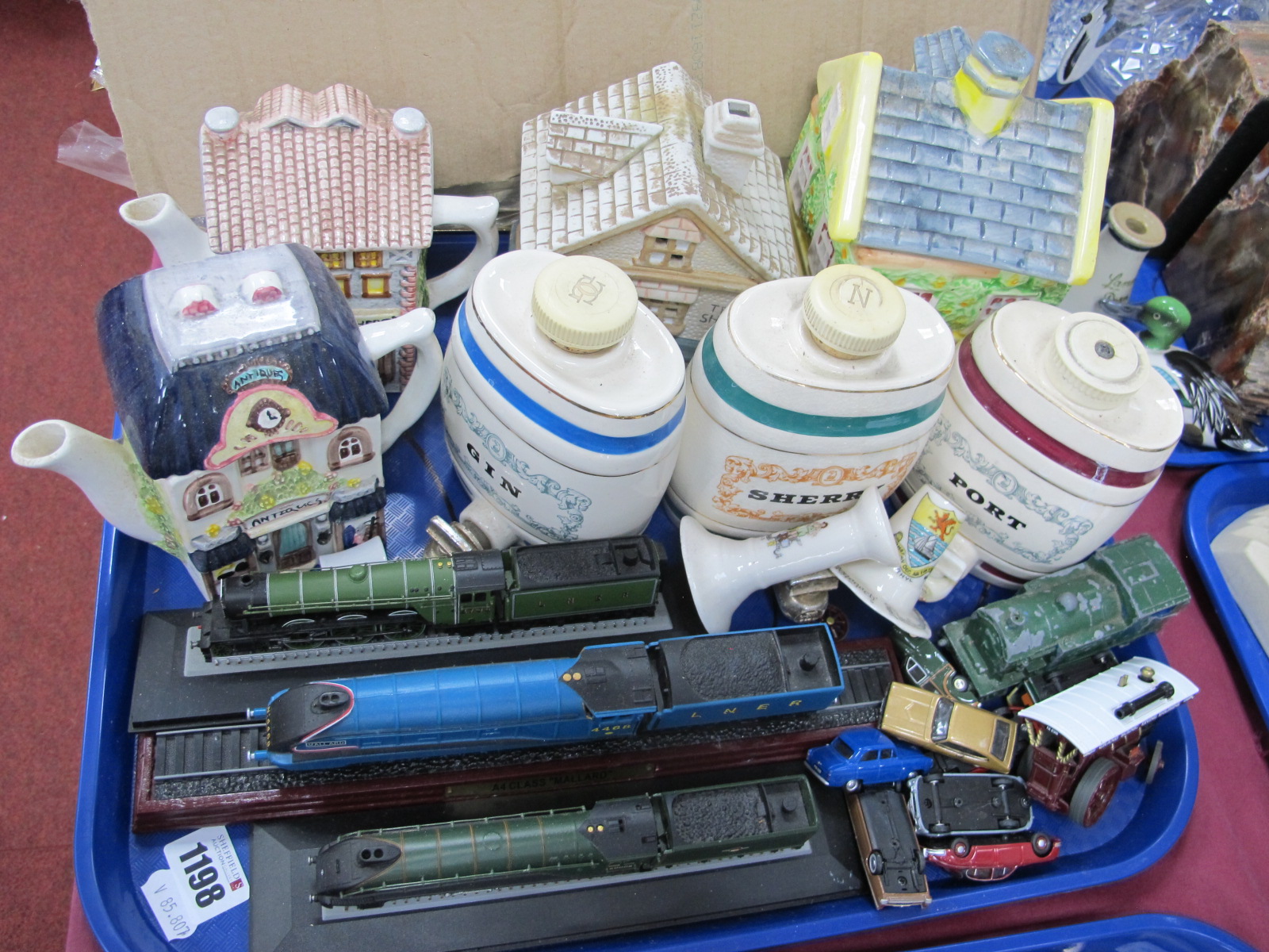 Three Wade Spirit Barrels, teapots, model trains, Dinky, etc:- One Tray.