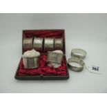 A Pair of Hallmarked Silver Napkin Rings, with gadrooned edge and engine turned decoration,