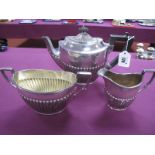 A James Dixon & Sons EPBM Three Piece Tea Set, each of oval semi reeded form. (3)