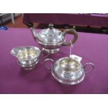 A Matched Hallmarked Silver Three Piece Bachelor's Tea Set, Henry Matthews, Birmingham 1923,