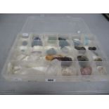 A Collection of Assorted Rocks / Crystals / Minerals, contained in a sectioned lidded box.